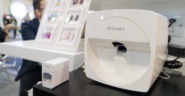 The O'2Nails mobile nail printer comes with an ultraviolet lamp for drying the nails. at Las Vegas Convention Center on Tuesday, Jan. 9th, 2018. Photo by Yukun Zhang / BU News Service.