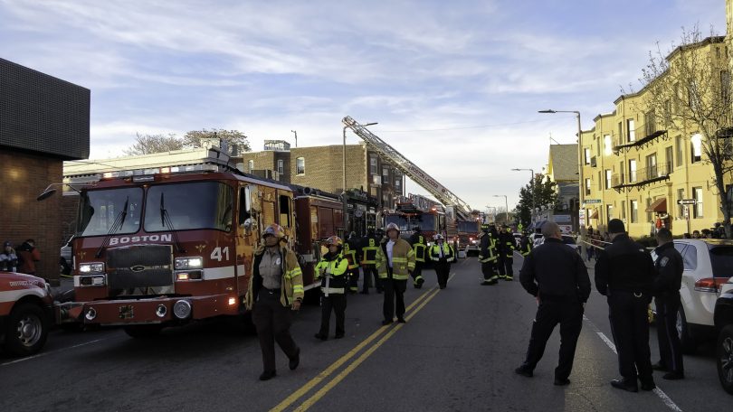 Boston Police and Fire Department officers block the street after a partial roof collapse at Common Ground Bar & Grill in Allston, Nov. 4. Photo by Aaron Ye / BU News Service.