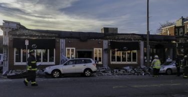 The Common Ground Bar & Grill’s roof partially collapsed on Nov. 4, at around 3 p.m., injuring two people and leaving six trapped inside the building. Photo by Aaron Ye / BU News Service