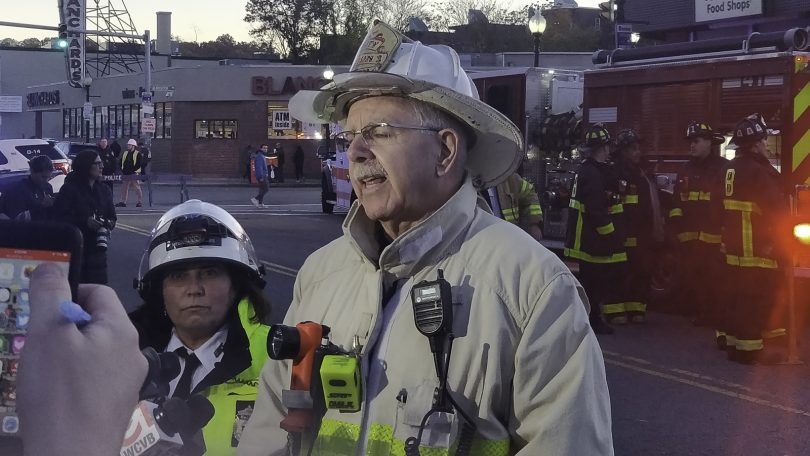 Deputy Fire Chief, Stephen Miller, addresses the media after a partial roof collapse at Common Ground Bar & Grill in Allston, Nov. 4. Photo by Aaron Ye / BU News Service.